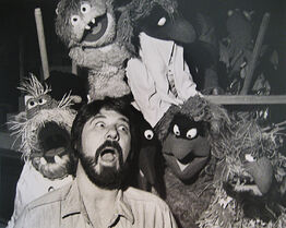 Muppet Monsters with photographer Art Murphy. Maybe from The Cosby Show?