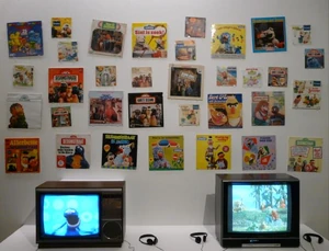 Audio and video corner with some international records displayed.