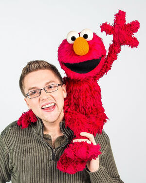 Ryan Dillon with Elmo