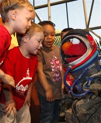 Elmo appears to promote One World, One Sky: Big Bird's Adventure on April 21, 2009