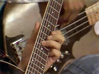 starts with close-up of guitar and bass, then organ, then drum, then bass; time is approx. 1:08, appears in Episode 0725