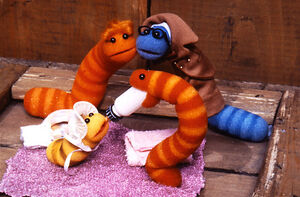 Slimey with his family (mother Eartha, father Dusty, and sister Sloppy).