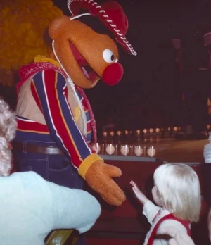 Ernie meets a young visitor.