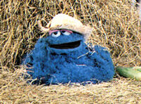 Cookie Monster as Little Boy Blue in Big Bird's Mother Goose.