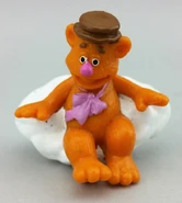 Fozzie Bear sitting in snow (can be frozen into an ice cube)