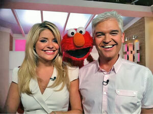 Holly Willoughby, Phillip Schofield and Elmo.