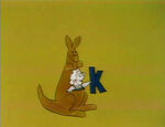 K: Kangaroo (lady in pouch)