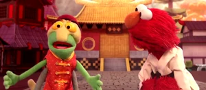 Elmo and his young grasshopper