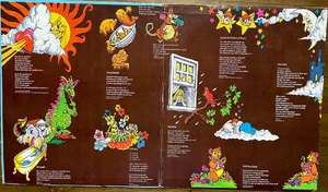 Inside the album's gatefold cover, with illustrations and partial lyrics.