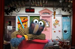 Gonzo paddles by in a bucket until it springs a leak and sinks.