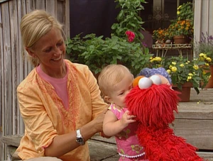 Vogel with her child in "Elmo's World