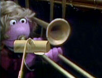 Dolores on trombone