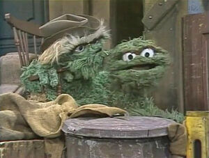 Oscar listens to the wisdom of his .