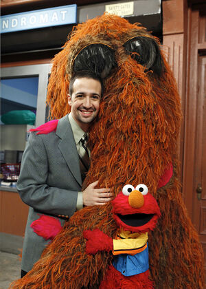 Lin-Manuel Miranda with Snuffy and Elmo