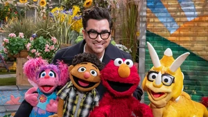  with Abby, Tamir, Elmo, and a Muppet triceratops