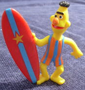 Bert with a surfboard