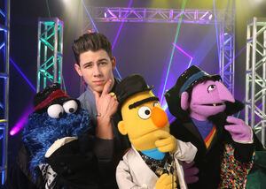Nick Jonas with ,  and  on Sesame Street.