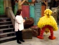 Big Bird shows Rosie his special trick.