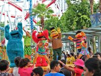 Elmo, Cookie Monster, Ernie, and Bert join the Soak Out Water Party in the summer of 2016.