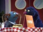 Grover's Restaurant: Grover Serves a Sandwich