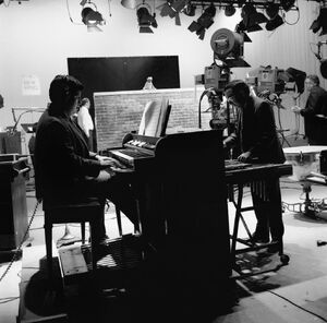 Joe Raposo on Sesame Street set.jpg
