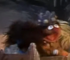 An Anything Muppet caveman and Ernie"Caveman Days: Toothbrush"