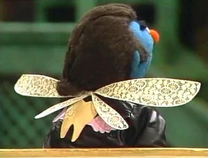 The Tooth Fairy's emblem on his leather jacket.