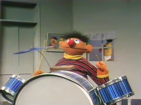 E&BErniePlaystheDrumsWhileBertKnocks