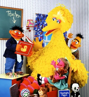 A copy of Goodnight, Pigeon is seen amongst the items in the "classroom