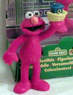 Elmo with a toy boat