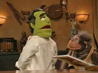 Prospective boneologist Sal Minella twists Johnny Fiama's head around in Muppets Tonight episode 201.