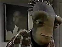 a portrait in Principal Sherman's office on Aliens in the Family