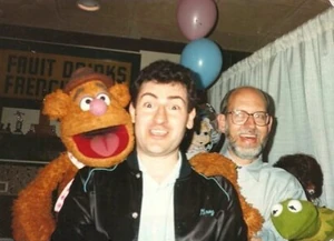 Berg with an adult Fozzie Bear (and Frank Oz)