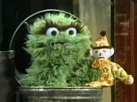 Oscar the Grouchfrowning clown doll