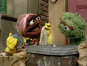 Can two very different Grouches share a trash can without driving each other crazy?