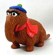 Mr. Snuffleupagus with a scarf and hat