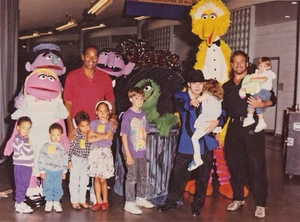 O. J. Simpson, , and Bob Golic with their children backstage at  in 1993