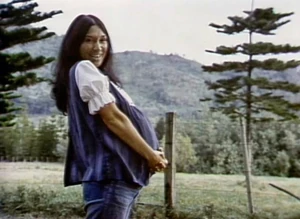 Buffy sends greetings, with child.