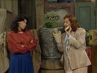 Mrs. Figueroa uses a washcloth hand puppet as she tries to convince Oscar to take a bath in Episode 2381.