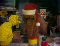 Xmasanother106.jpg (186 KB) Snuffy voluntarily gets into a barrel to show how Santa gets down a chimney.
