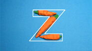 3 carrots take the shape of the letter Z.