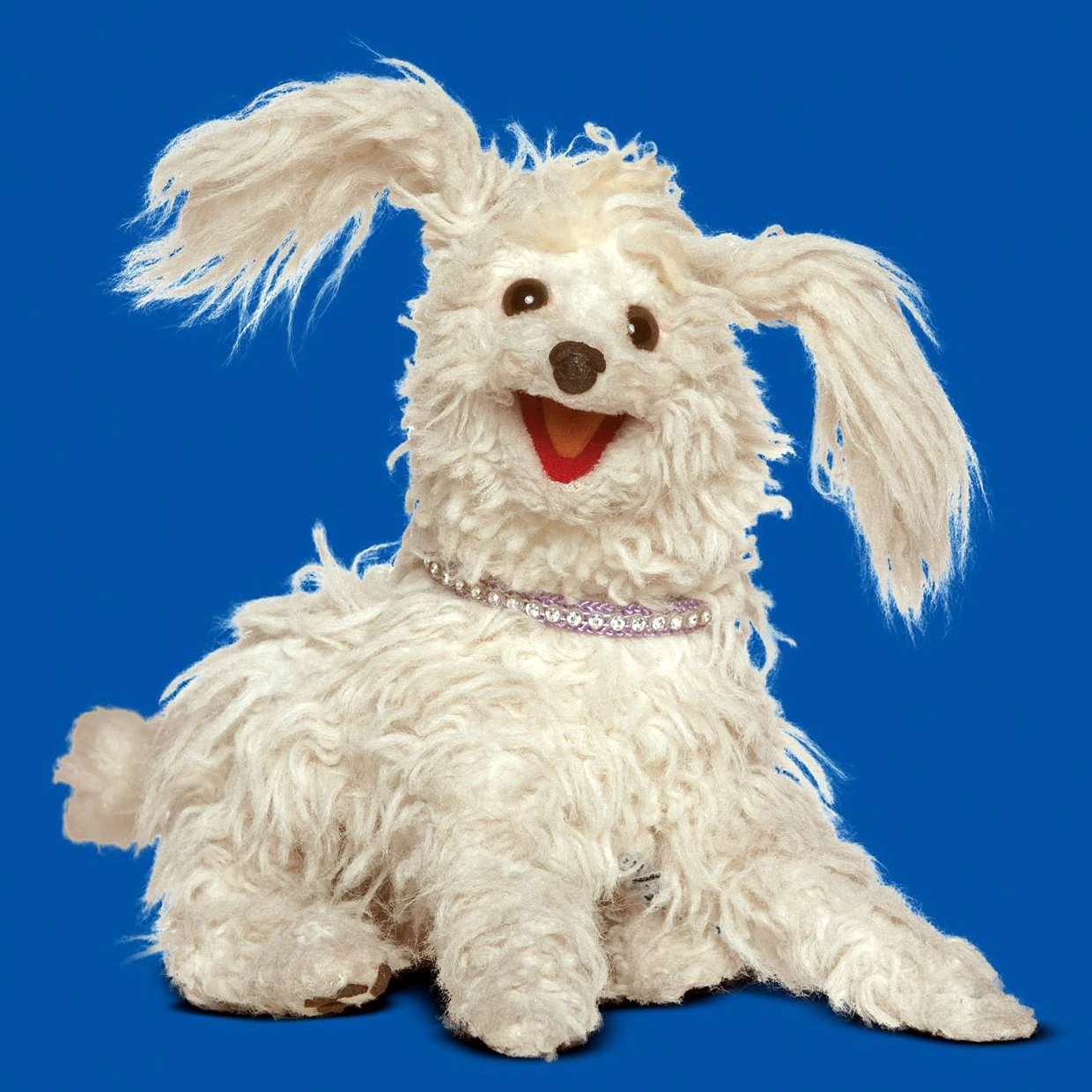 white dog puppet