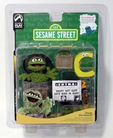 Oscar the Grouch figure, with Slimey and other accessories.