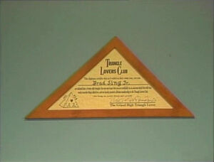 Dr. Sing's membership certificate, hung proudly among his academic degrees.