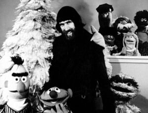 Jim Henson and his band of Muppets.