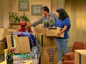 Luis prepares to move into Maria's apartment.