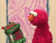 An accordion in Elmo's World: Music