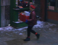 Once Upon a Sesame Street ChristmasStreet resident with presents[2]