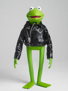 WILD FROGS Kermit January 7th announced for February 2011 Kermit the Frog, as a member of the WILD FROGS, comes dressed in a faux-leather jacket with stud detailing. The back of the jacket features the WILD FROGS logo. 11" tall.