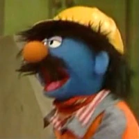 construction worker in "Waitin' at the Bus Stop Sign for You"